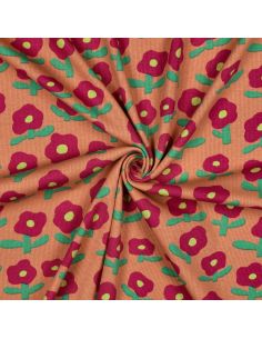 Tissu jersey coton maille côtelé Jennifer Bouron - Fleurs rouge sur fond melon