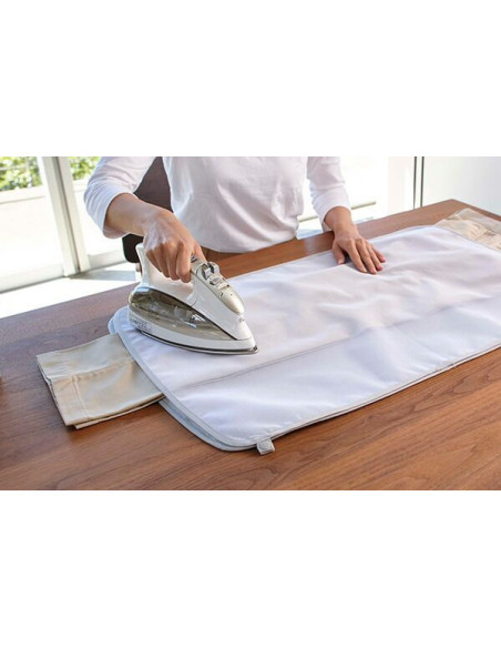 Tapis de repassage enroulable avec pattemouille amovible
