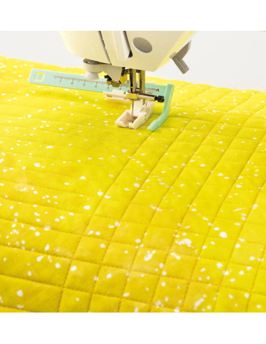 Pie de guía para acolchado para máquina de coser