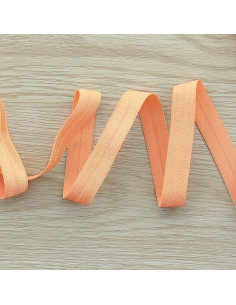 Cinta al bies elástica pre-plegada satinada de 15 mm de ancho - Melón