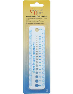 Regla medidora para agujas de tejer