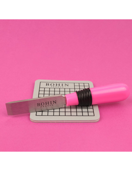 Abrir ojal con alfombrilla de protección