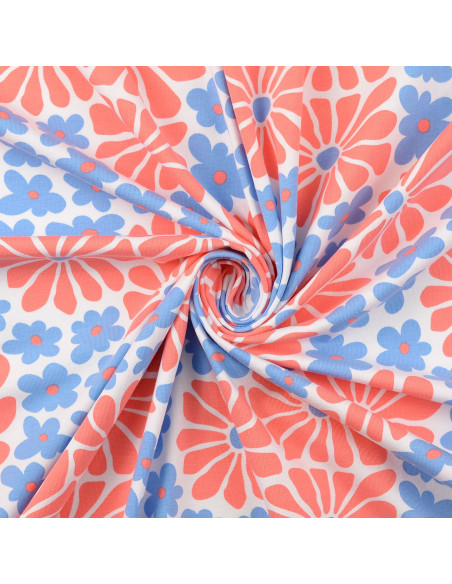 Tejido de punto fantasía - Flores sesenteras rojas y azules