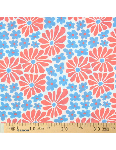 Tejido de punto fantasía - Flores sesenteras rojas y azules