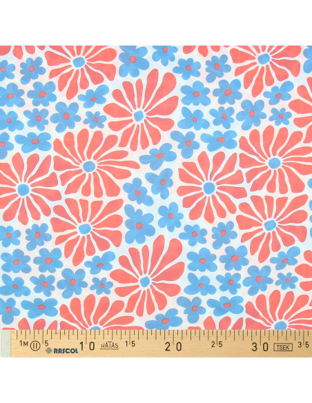 Tejido de punto fantasía - Flores sesenteras rojas y azules