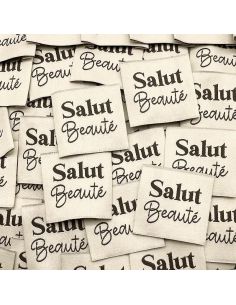 Lote de 5 etiquetas tejidas para coser Hola belleza - Crema