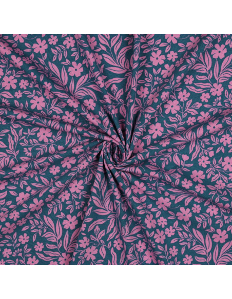 Tejido de punto con flores - Rosa sobre fondo azul petróleo