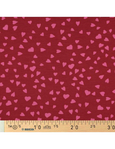 Tejido de sudadera afelpada rojo - Corazones rosa
